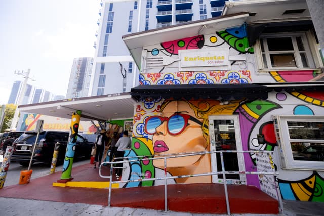 Enriqueta's Sandwich Shop colorful storefront mural in Miami